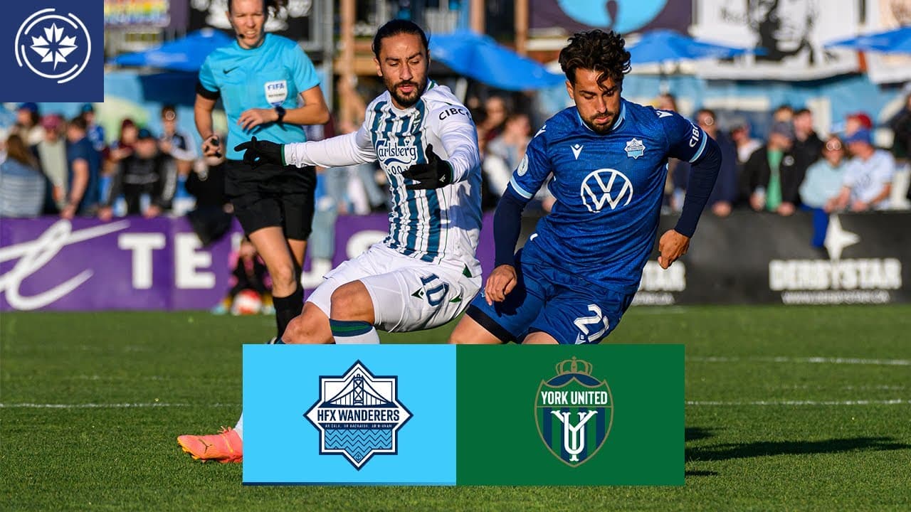 HFX Wanderers FC player challenges York United player HFX Wanderers FC player challenges York United player