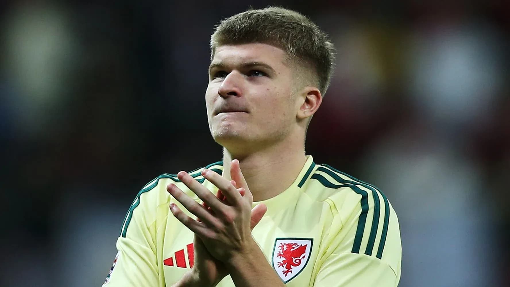 Player applauding fans after a match Player applauding fans after a match