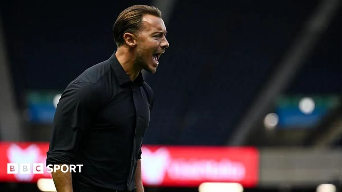 Coach shouting instructions on the sidelines during match Coach shouting instructions on the sidelines during match