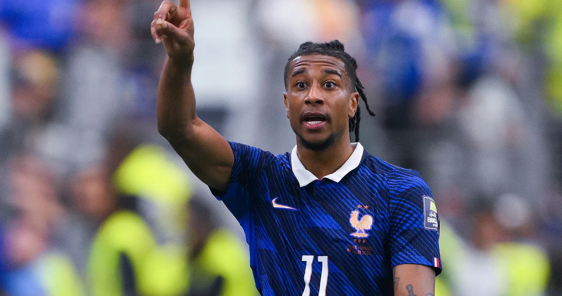 Player gesturing during football match for France Player gesturing during football match for France