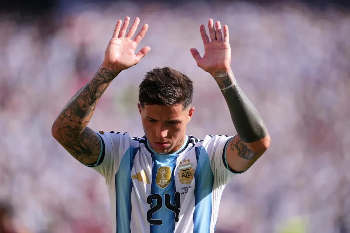 Player raising hands during match with Argentina jersey Player raising hands during match with Argentina jersey