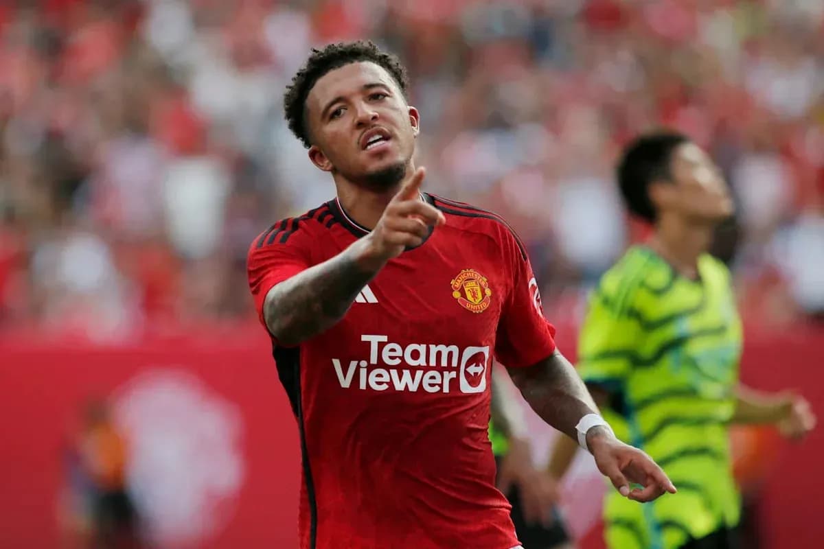 Player celebrating a goal in Manchester United jersey Player celebrating a goal in Manchester United jersey