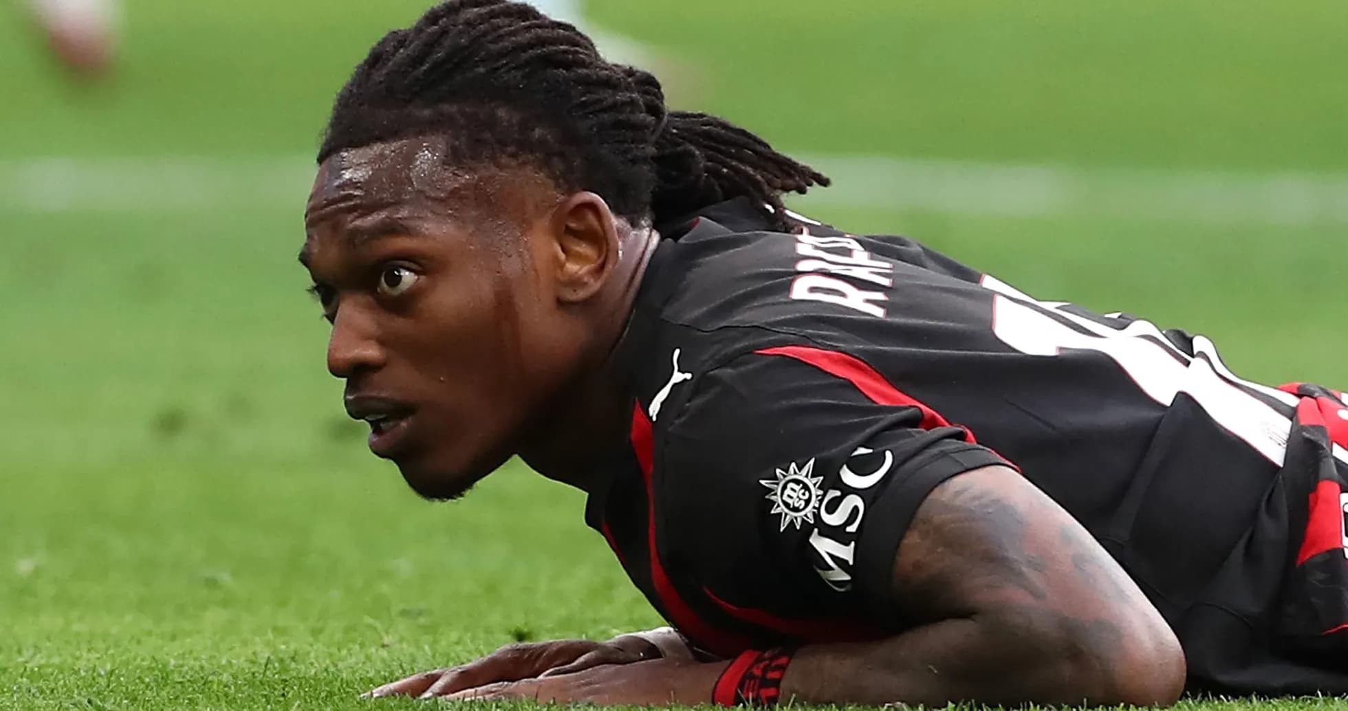 Player lying on the pitch during match action Player lying on the pitch during match action