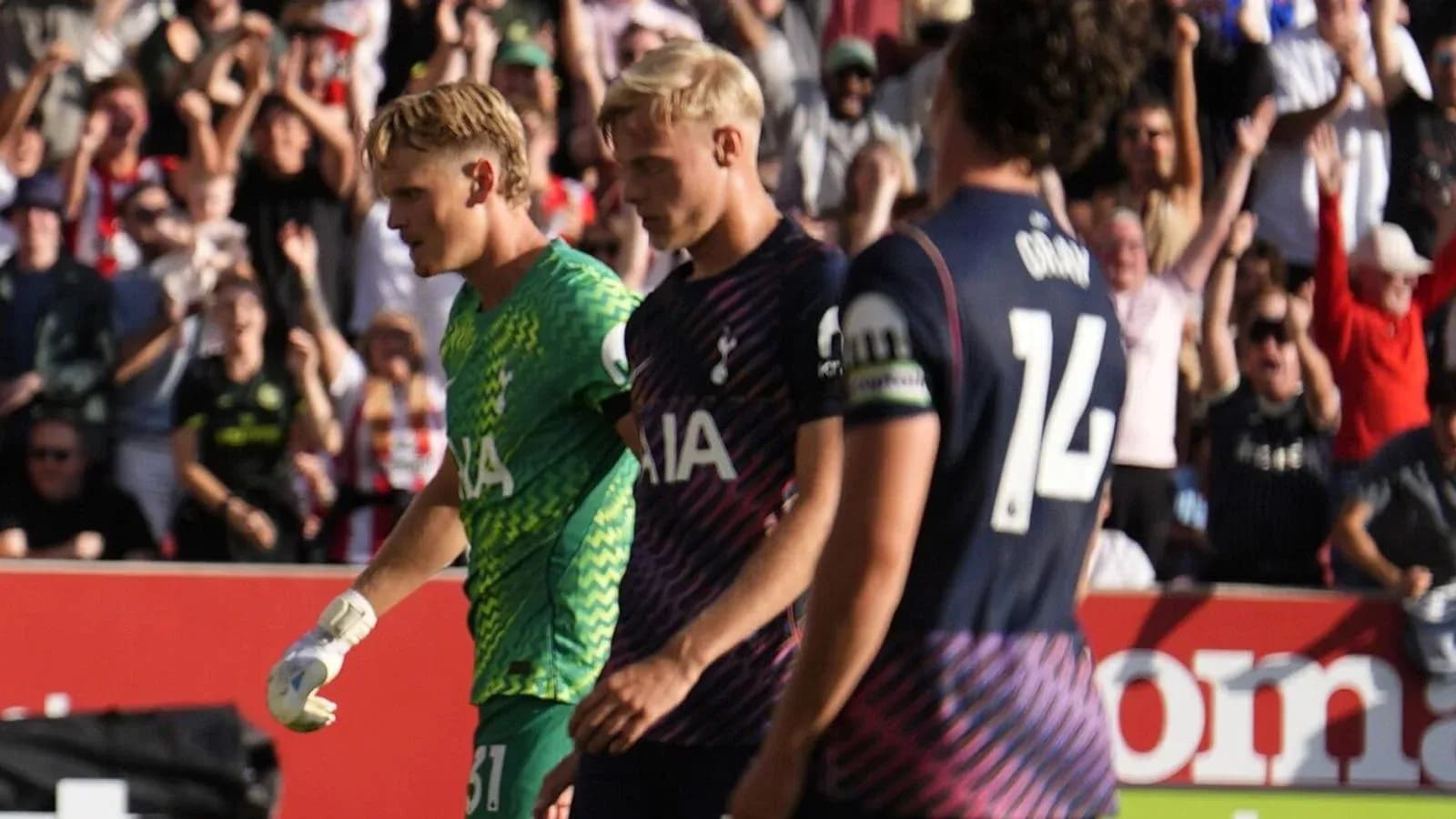 Tottenham players walking past celebrating fans Tottenham players walking past celebrating fans