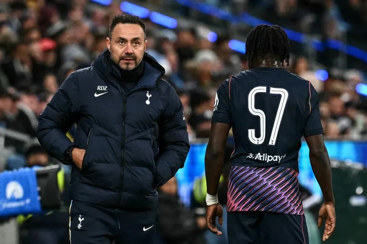 Tottenham manager interacting with player during match Tottenham manager interacting with player during match