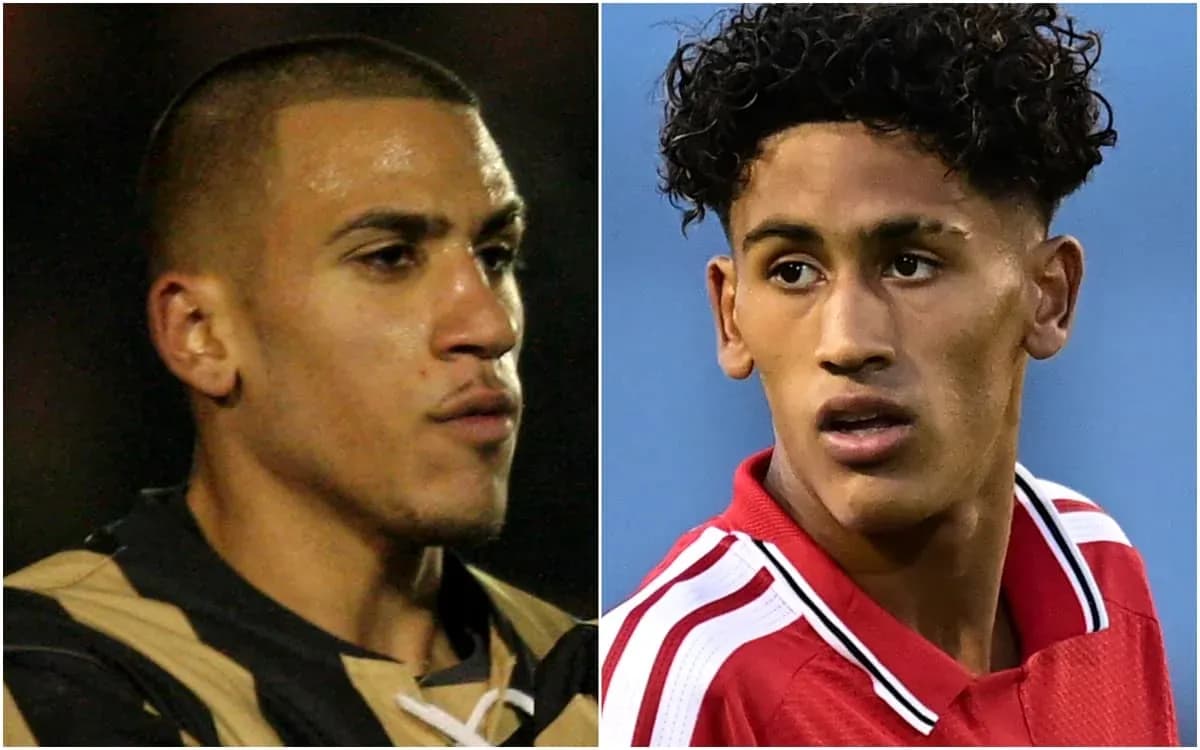 Two football players in different kits facing camera Two football players in different kits facing camera