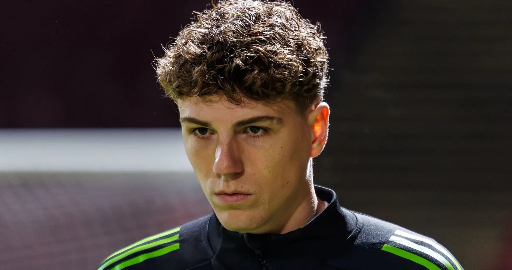 Player in training gear looking focused before match Player in training gear looking focused before match