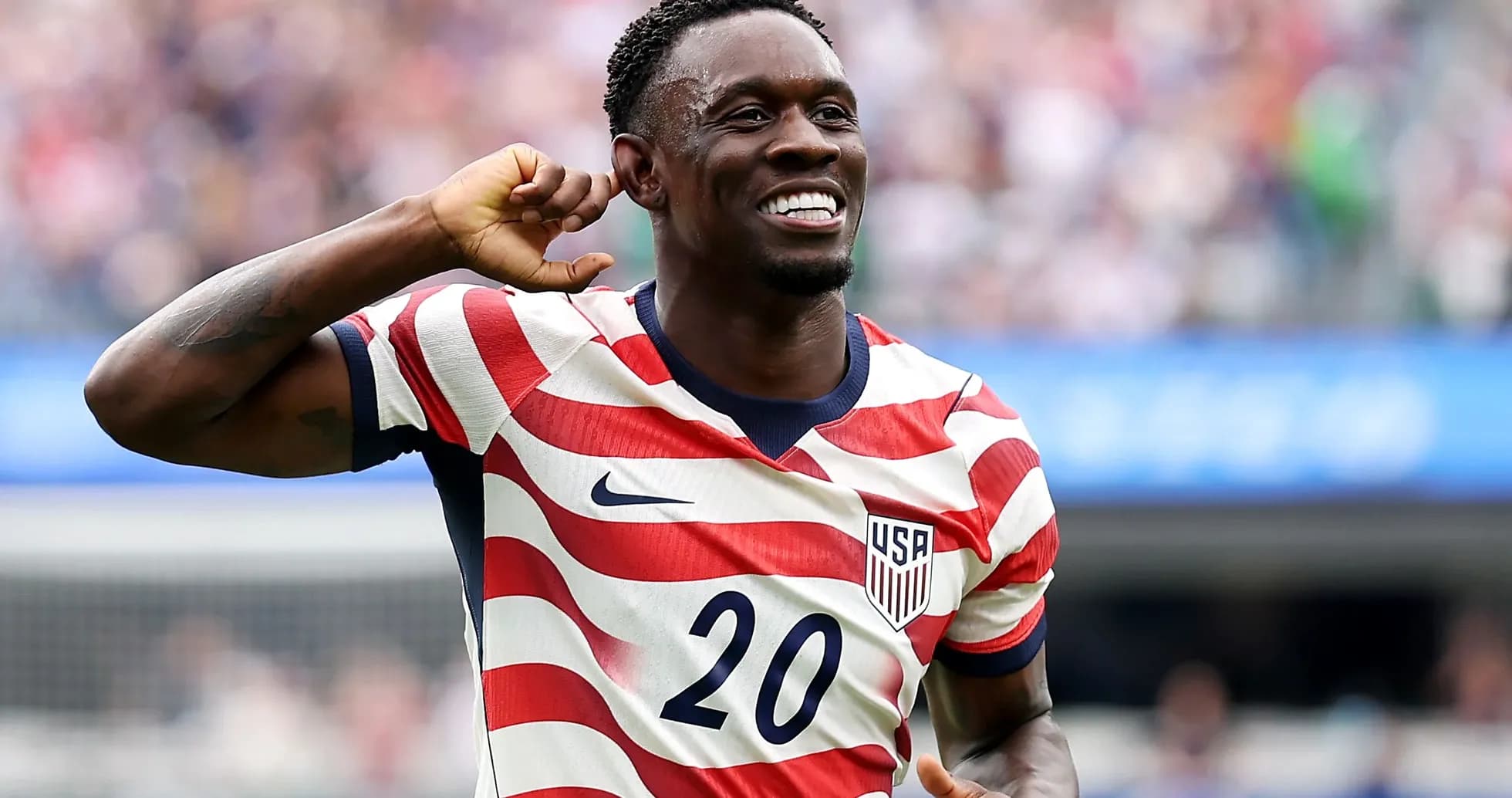 Player celebrating a goal in USA jersey Player celebrating a goal in USA jersey
