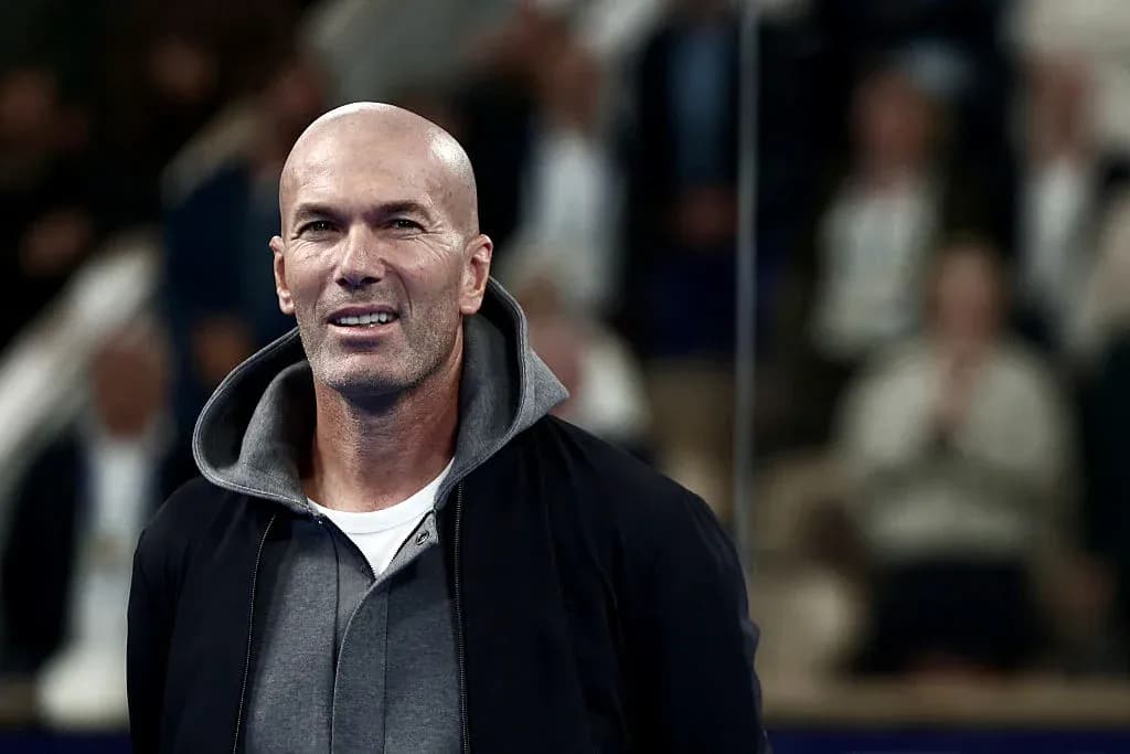 Man smiling while standing in a crowd Man smiling while standing in a crowd