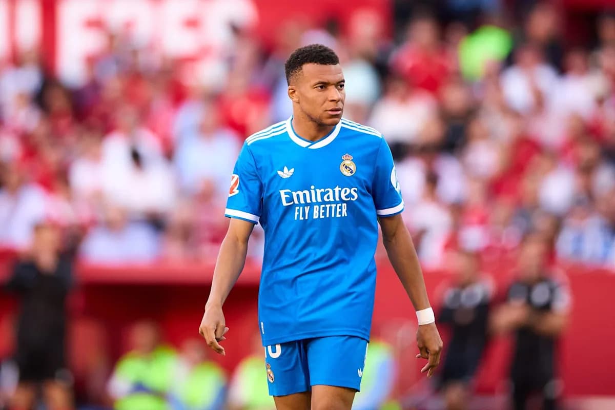 Player in blue Real Madrid kit during match Player in blue Real Madrid kit during match