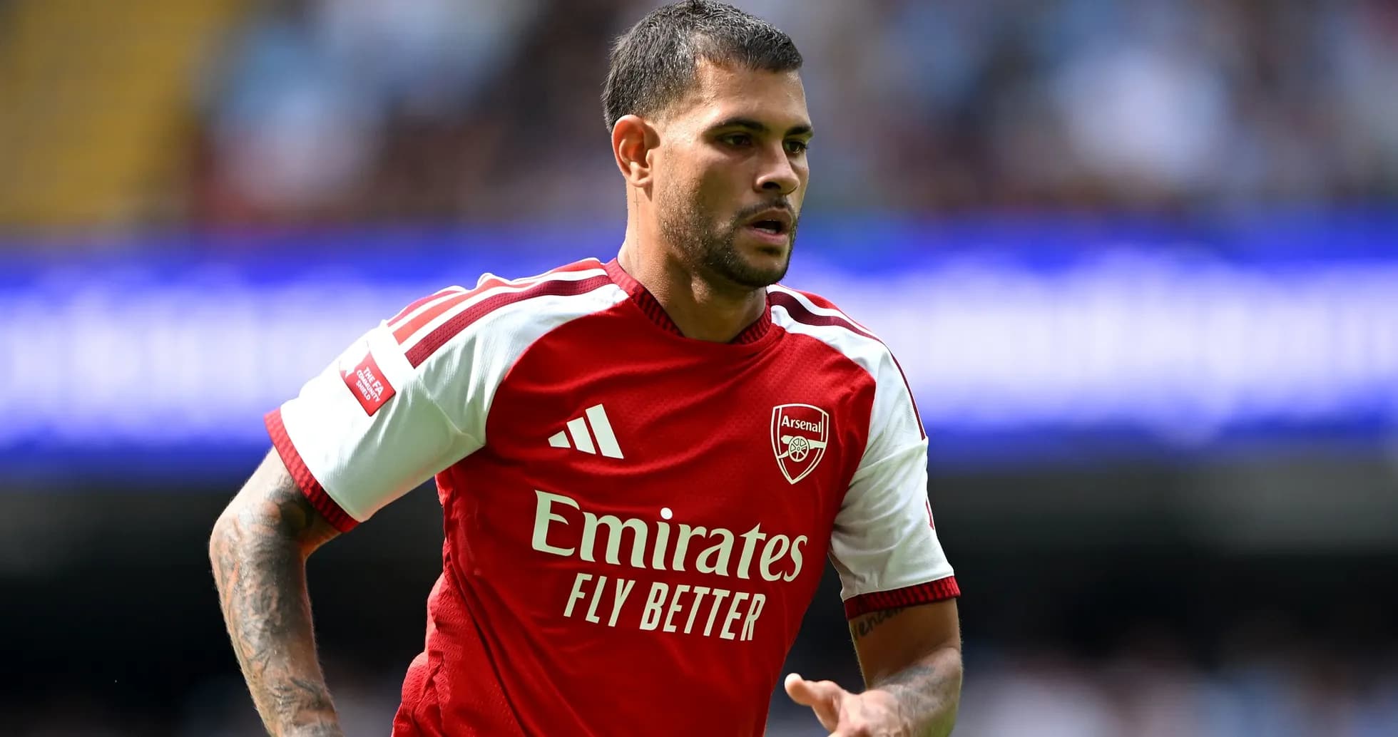 Player in Arsenal jersey during match action Player in Arsenal jersey during match action