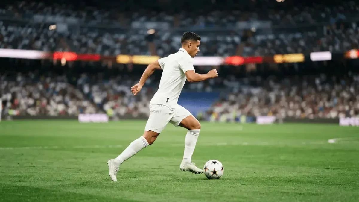 Player running with ball during football match Player running with ball during football match