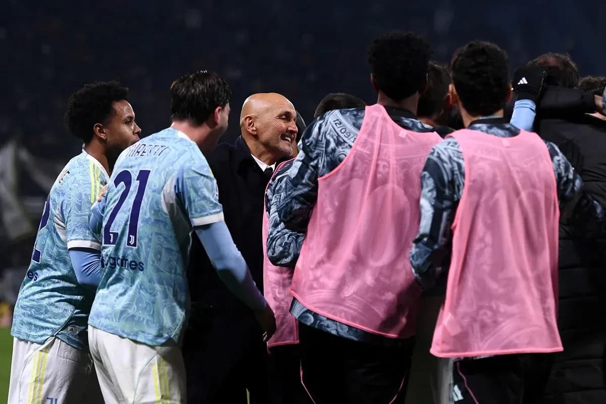 Team celebrating with coach after match victory Team celebrating with coach after match victory