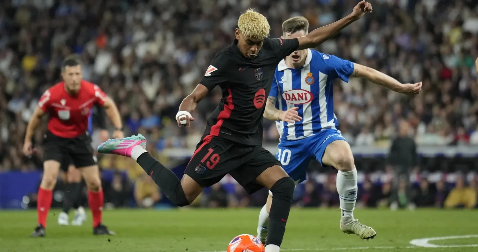 Player from Barcelona shooting during match against Espanyol Player from Barcelona shooting during match against Espanyol
