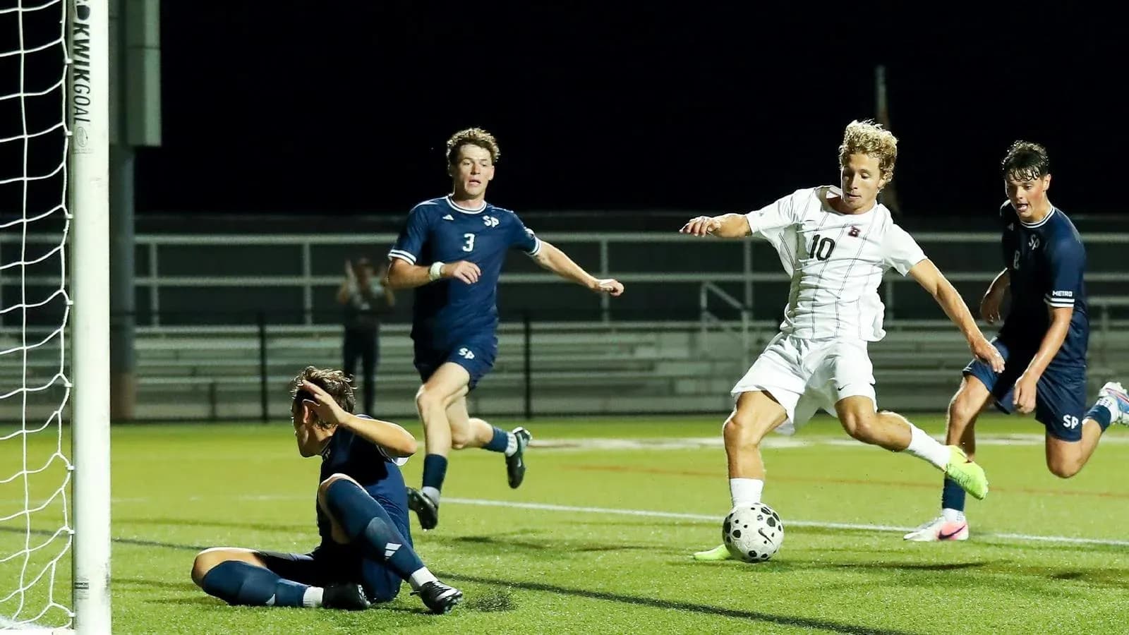 Player attempting to score near the goal line Player attempting to score near the goal line