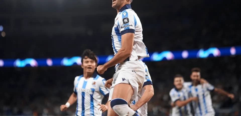 Real Sociedad player celebrating a goal Real Sociedad player celebrating a goal