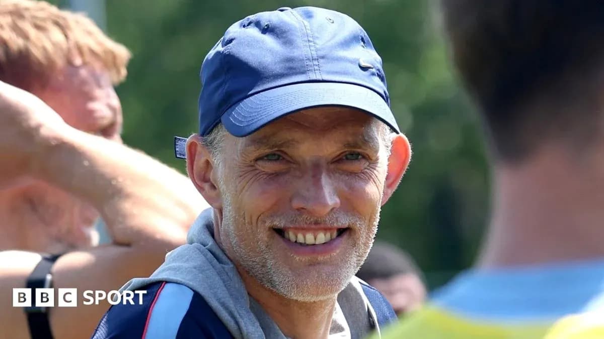 Coach smiling during training session outdoors Coach smiling during training session outdoors