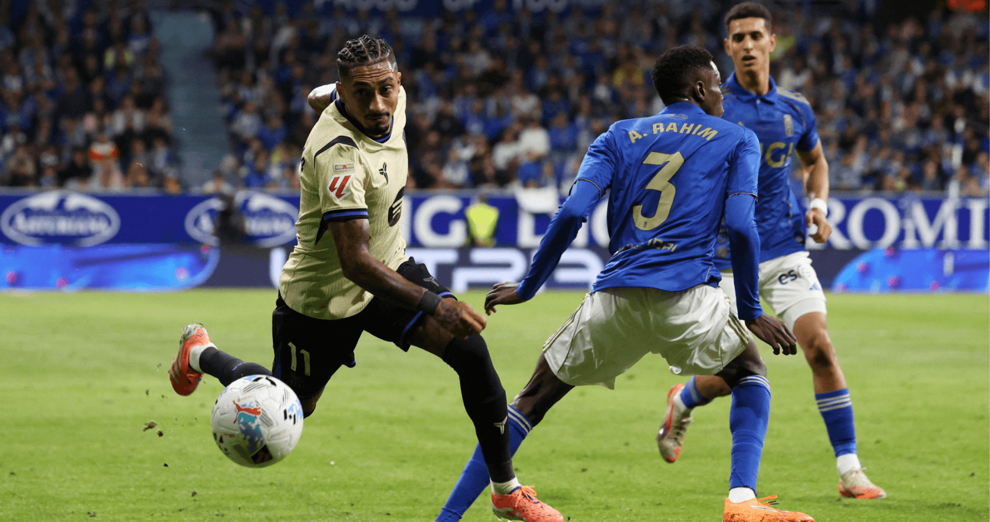Player tackling during Oviedo vs Alaves match Player tackling during Oviedo vs Alaves match