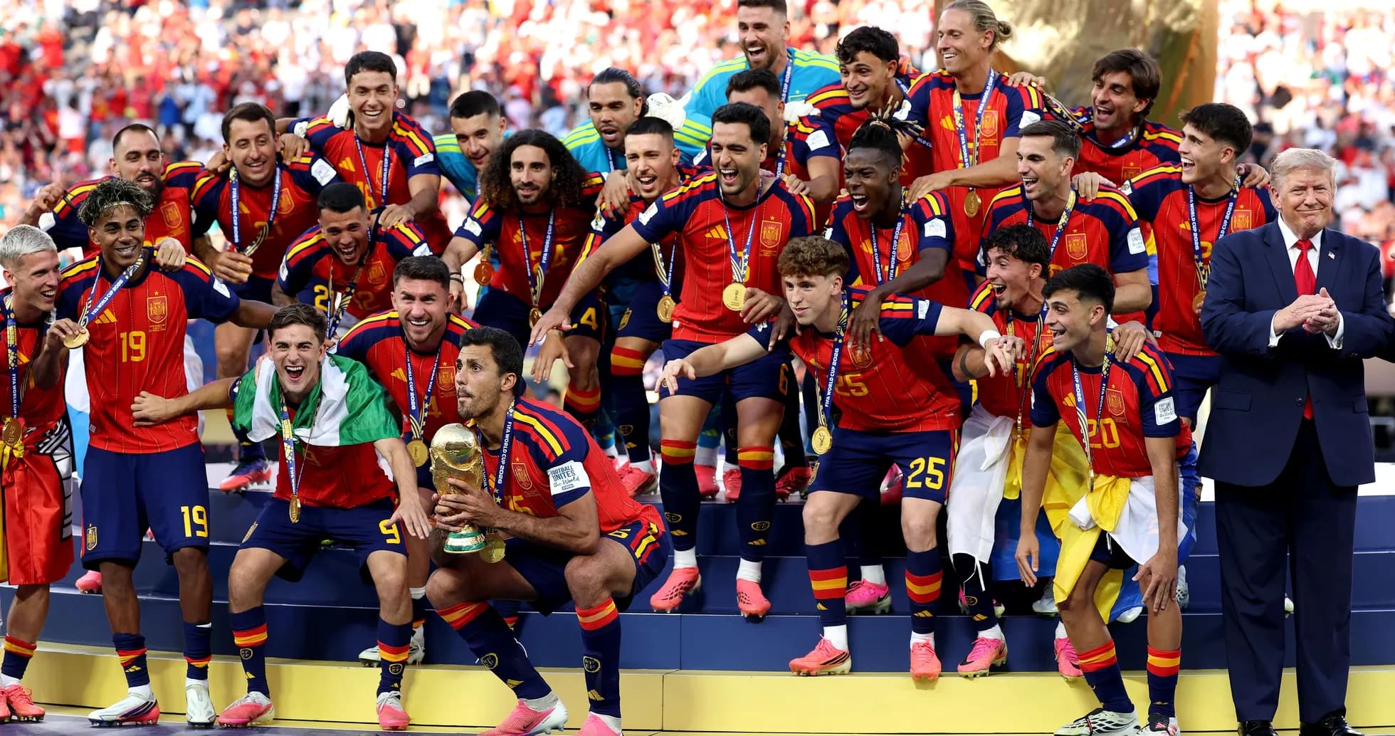 Spain national team celebrating World Cup victory on stage Spain national team celebrating World Cup victory on stage