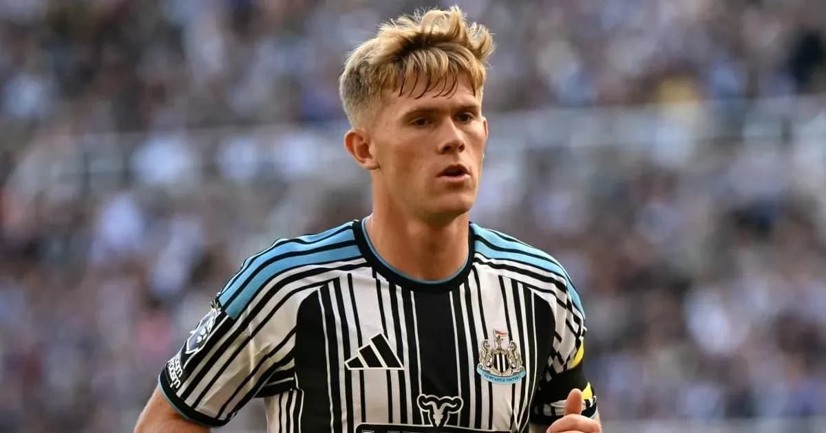 Newcastle United player running during a match Newcastle United player running during a match