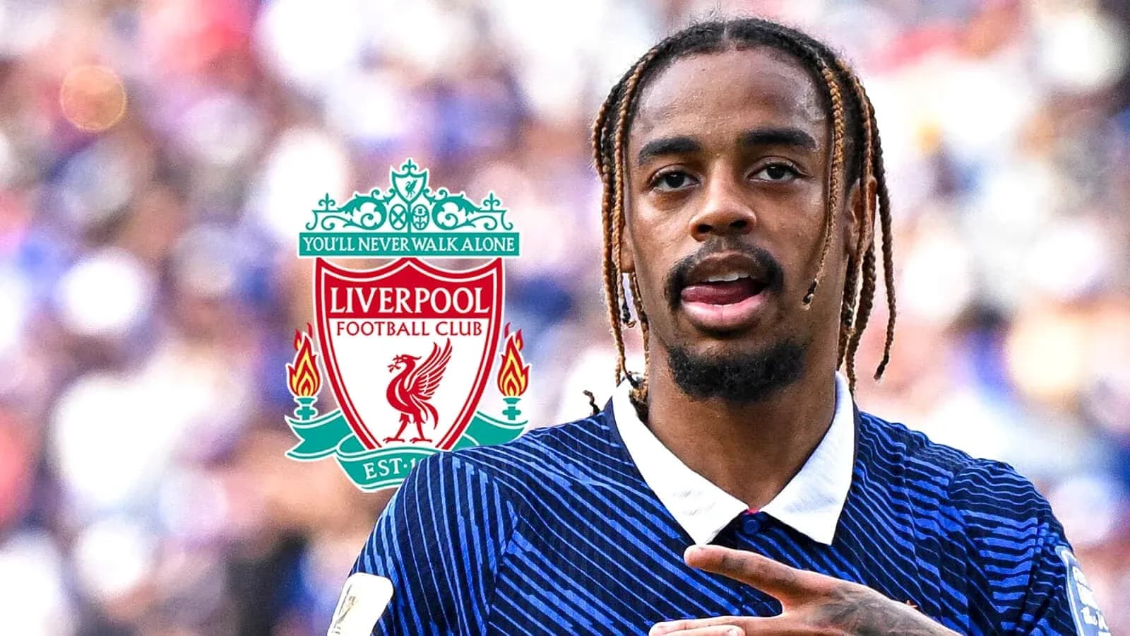 Player gesturing during match with Liverpool logo Player gesturing during match with Liverpool logo