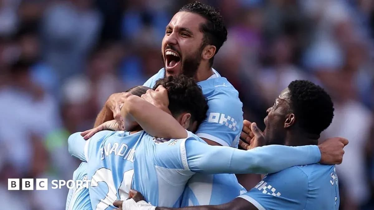 Players celebrating a goal during a match Players celebrating a goal during a match