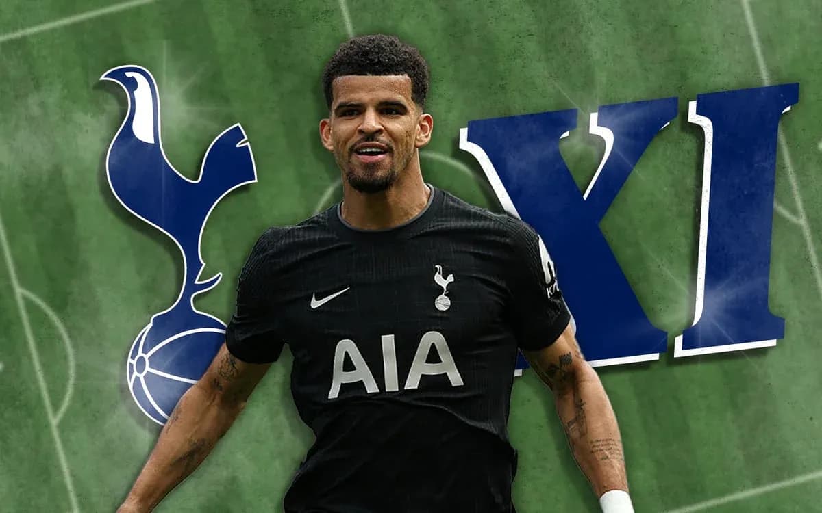 Player celebrating in Tottenham kit on pitch Player celebrating in Tottenham kit on pitch