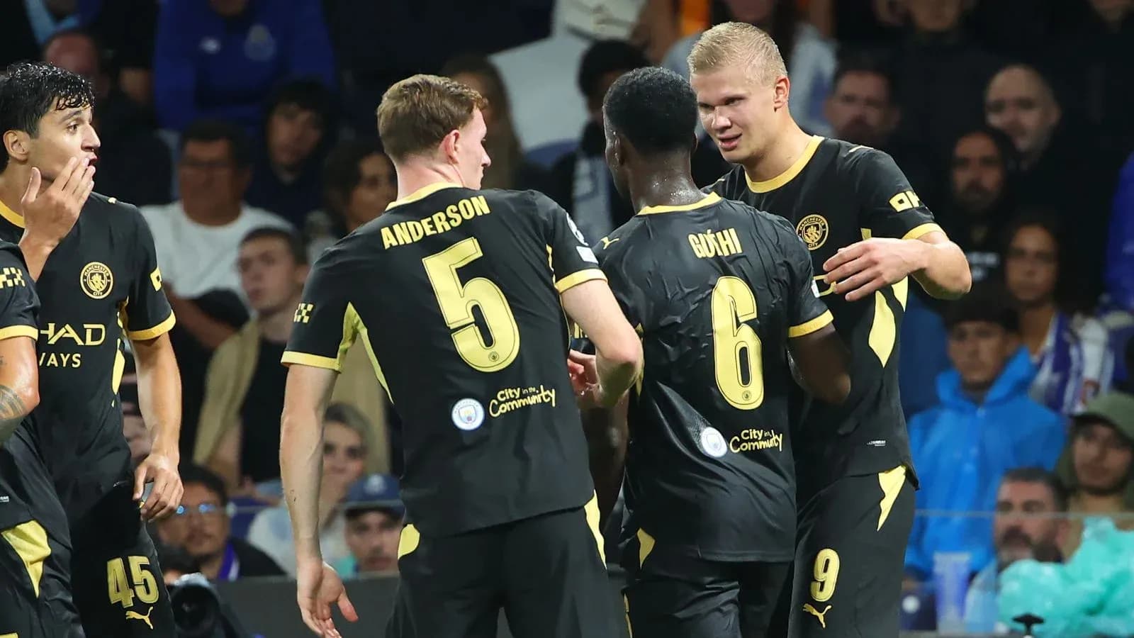 Players celebrating a goal during a match Players celebrating a goal during a match
