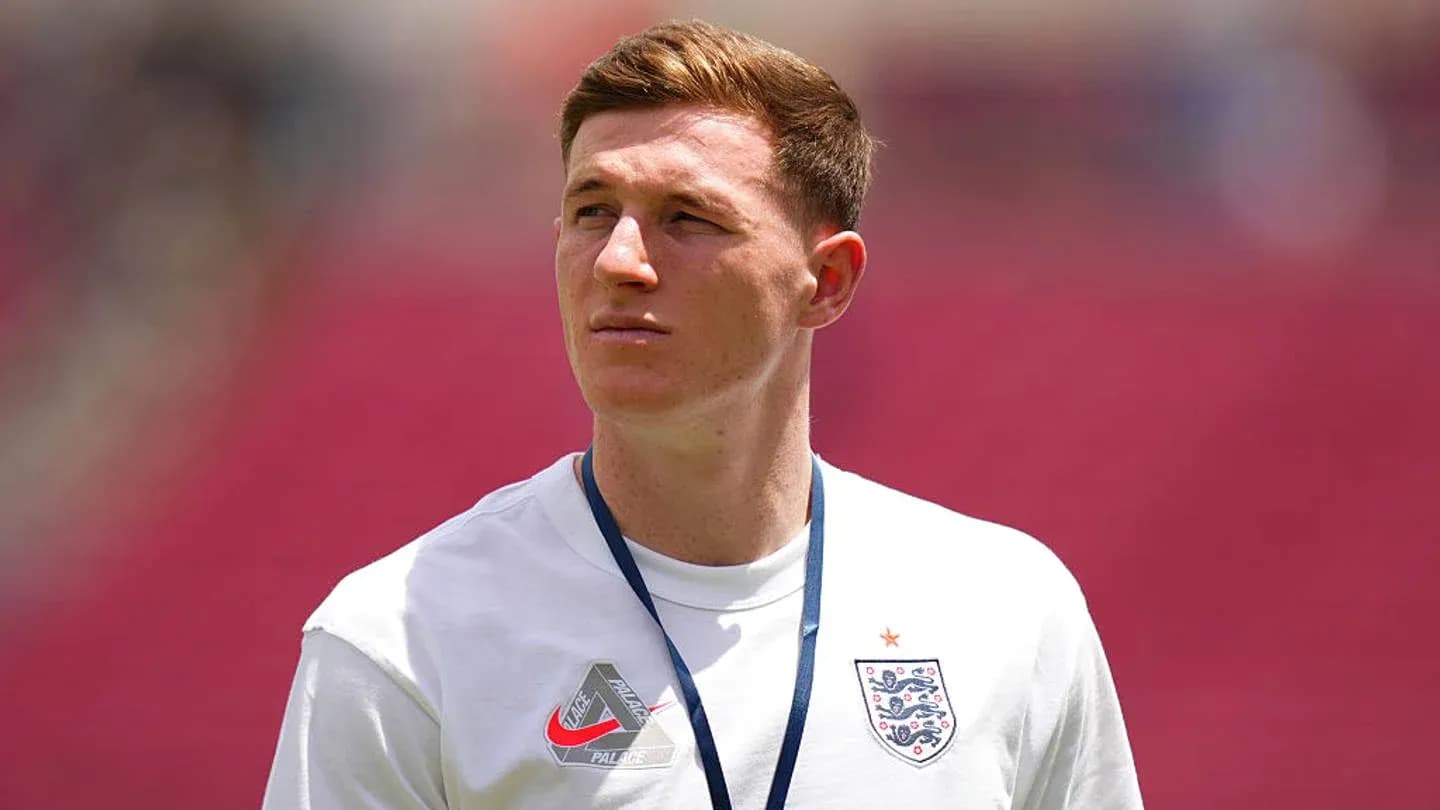 Player wearing England kit on the pitch Player wearing England kit on the pitch