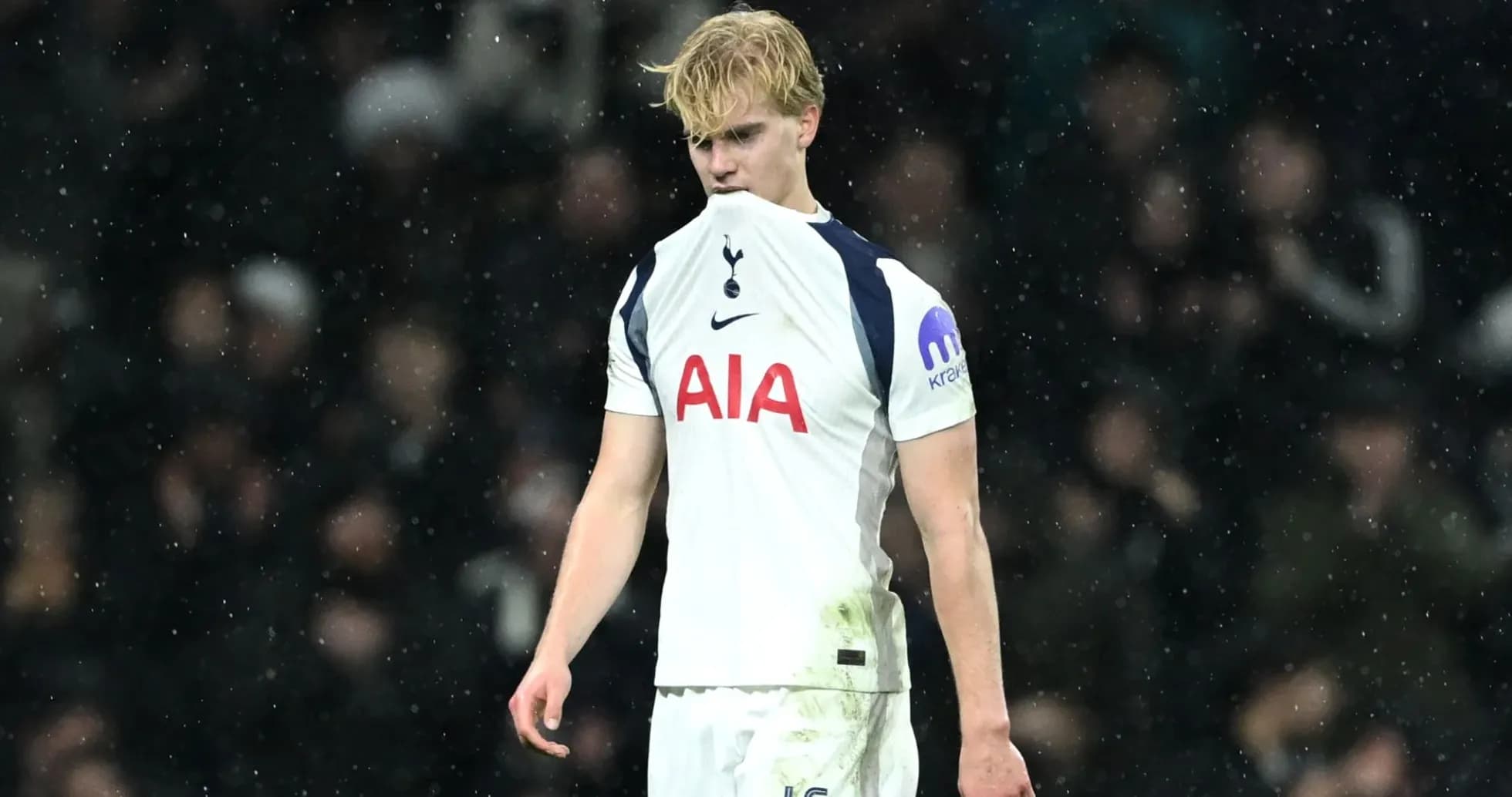 Player looking dejected during a rainy match Player looking dejected during a rainy match