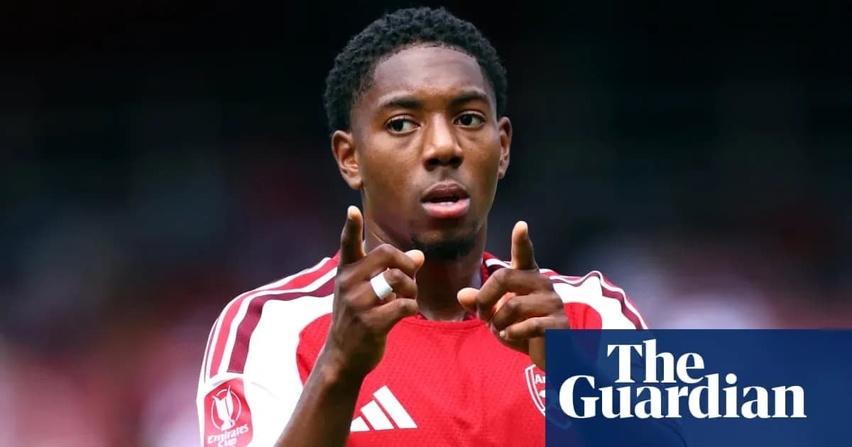 Player gesturing during a football match Player gesturing during a football match