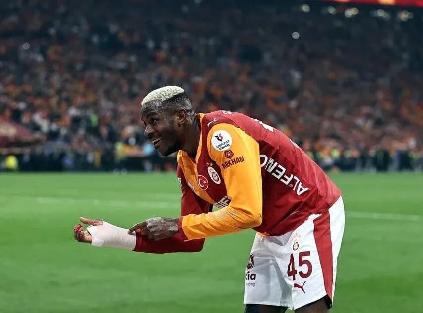Player celebrating on the field during match Player celebrating on the field during match