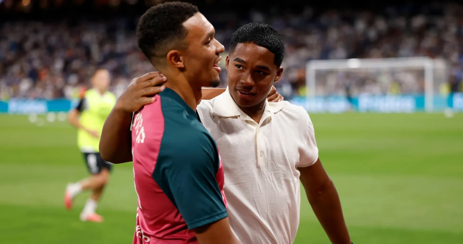 Two players interacting on the field before match Two players interacting on the field before match