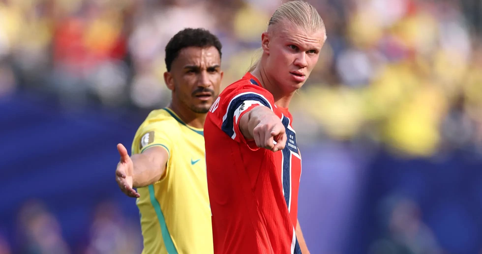 Two players arguing during a football match Two players arguing during a football match