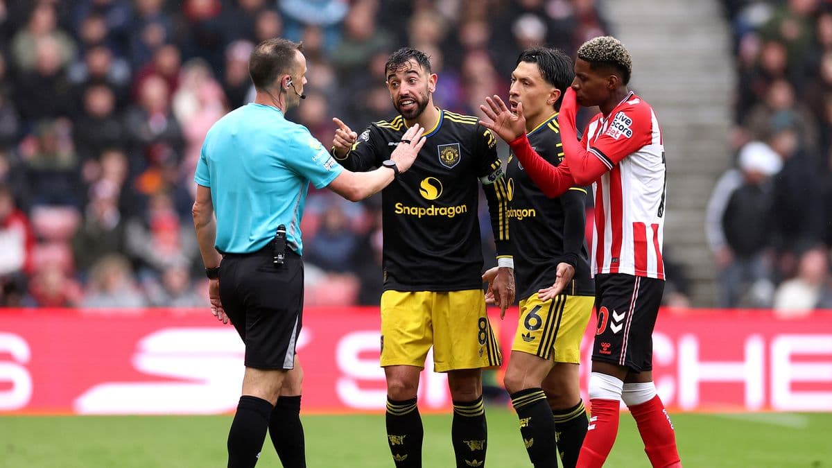 Players arguing with referee during a match Players arguing with referee during a match