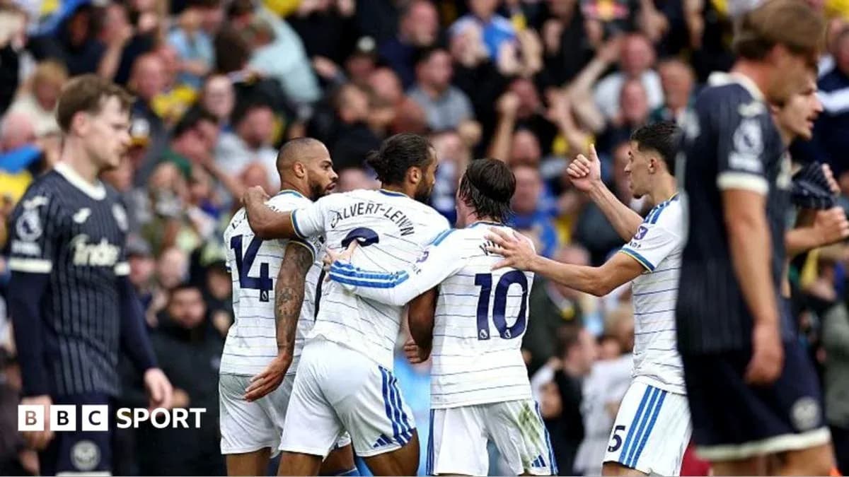 Players celebrating a goal during a match Players celebrating a goal during a match