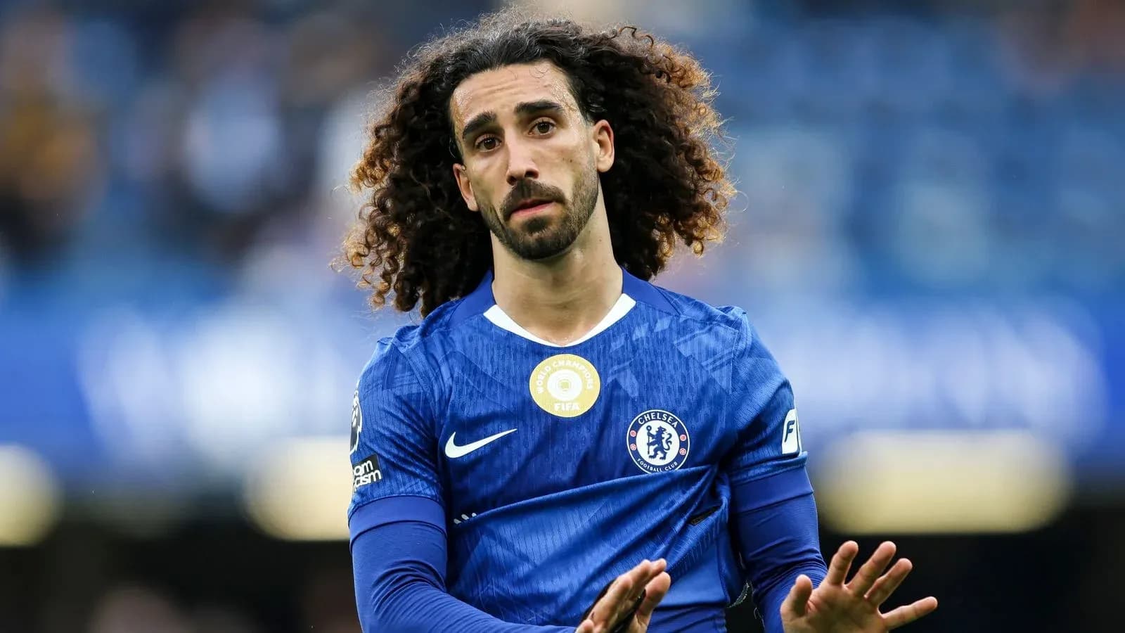 Chelsea player gesturing during match on field Chelsea player gesturing during match on field
