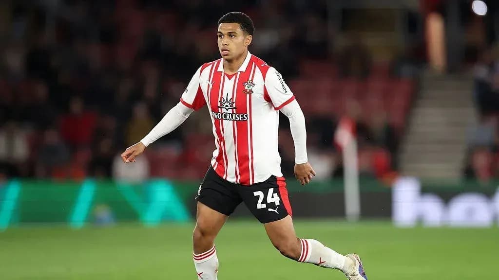 Player in Southampton kit running on the pitch Player in Southampton kit running on the pitch