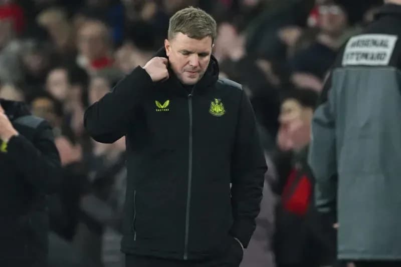 Newcastle United manager walking on the sideline Newcastle United manager walking on the sideline