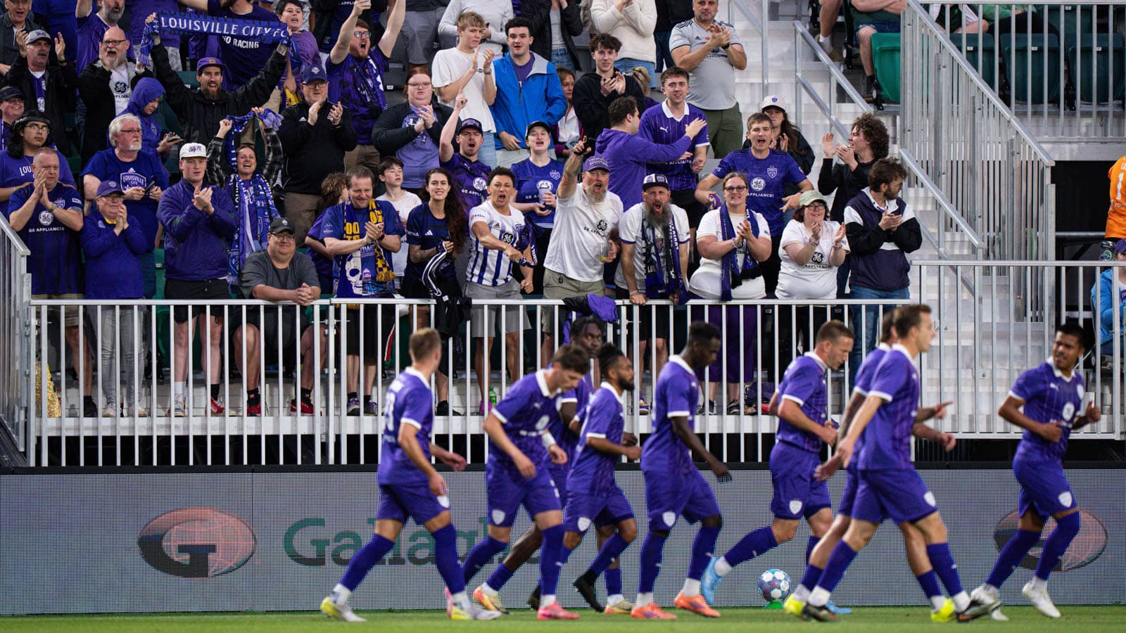 Louisville City FC fans celebrating during match Louisville City FC fans celebrating during match