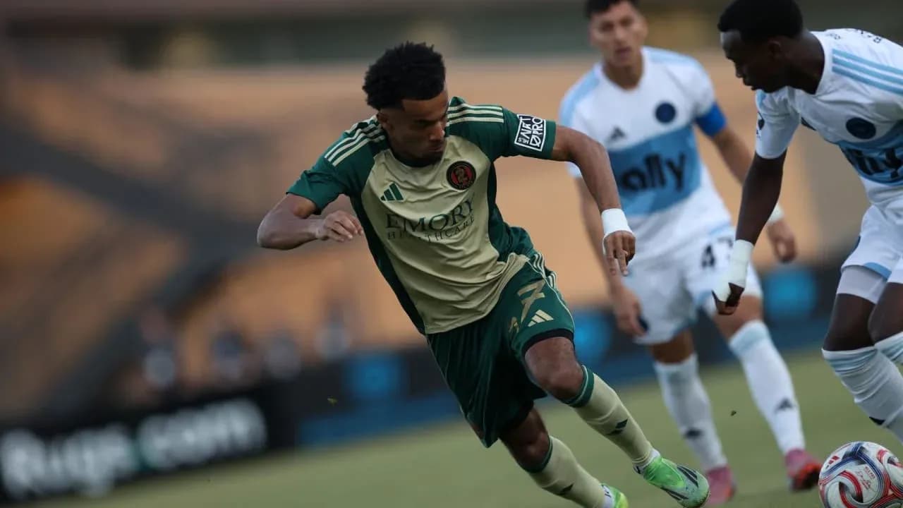 Atlanta United II player dribbling past opponent Atlanta United II player dribbling past opponent