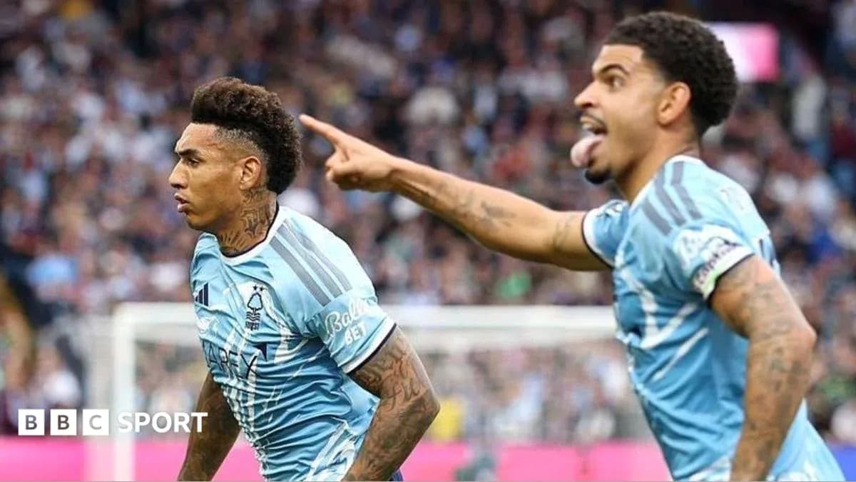 Two Nottingham Forest players celebrating a goal Two Nottingham Forest players celebrating a goal