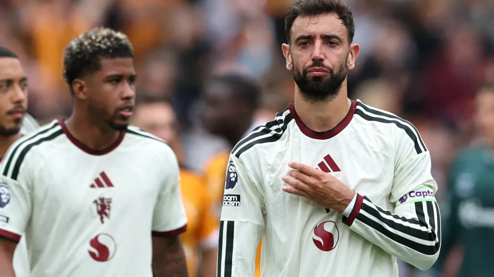 Players walking off the pitch after a match Players walking off the pitch after a match