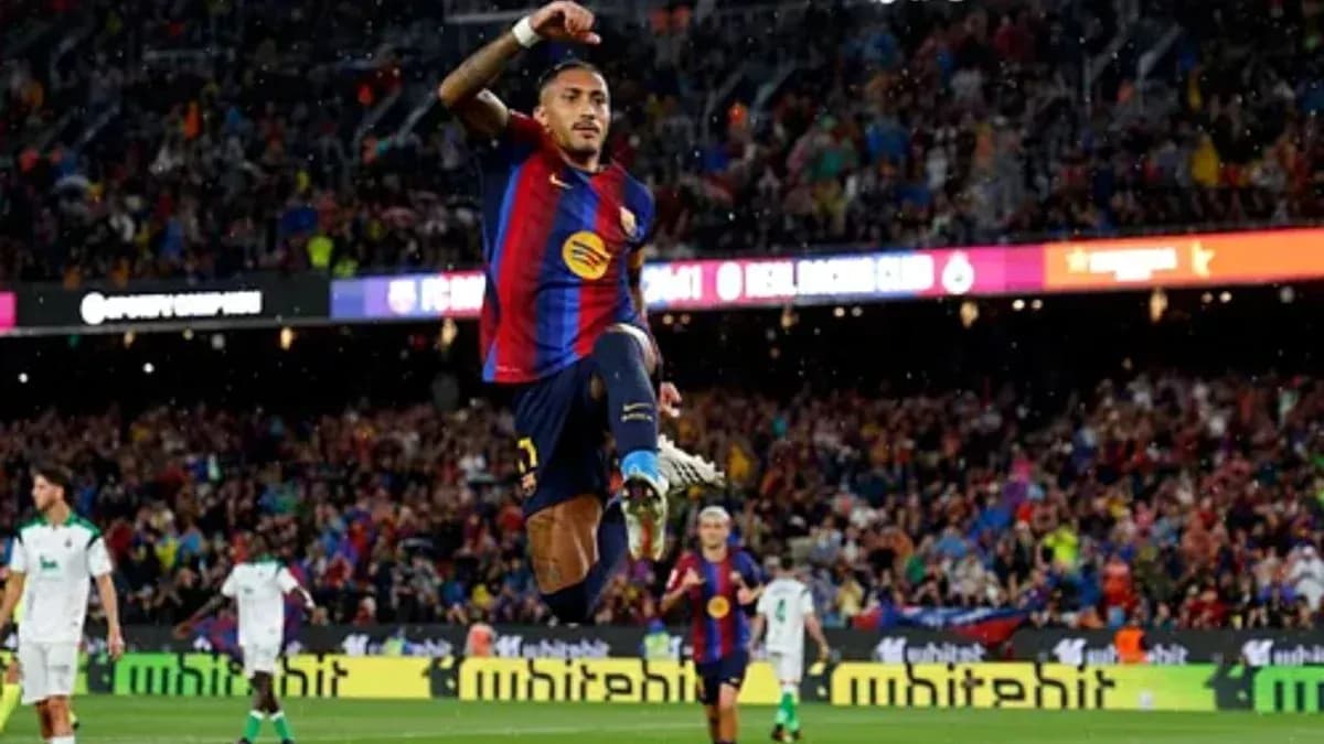 Player celebrating goal during FC Barcelona match Player celebrating goal during FC Barcelona match