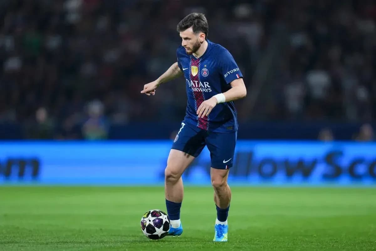 Player dribbling ball during match for PSG Player dribbling ball during match for PSG