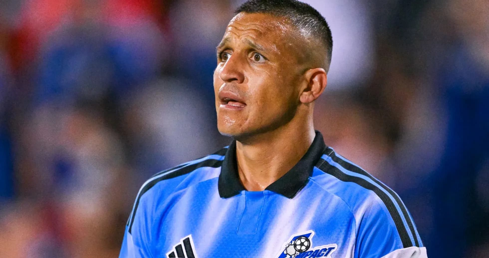 Player in blue jersey during soccer match Player in blue jersey during soccer match