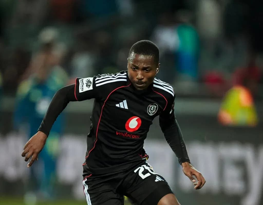 Player running during a match in black jersey Player running during a match in black jersey