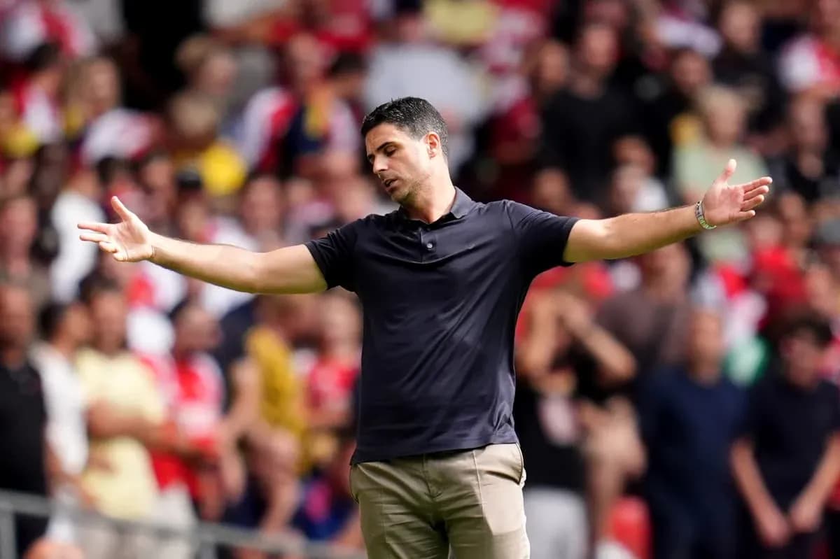 Coach gesturing to crowd during a match Coach gesturing to crowd during a match