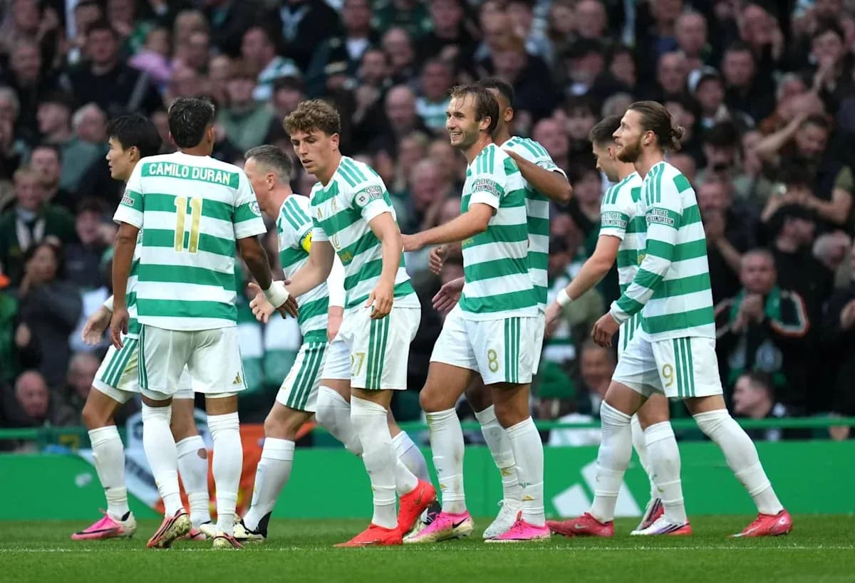 Celtic players celebrating a goal during match Celtic players celebrating a goal during match