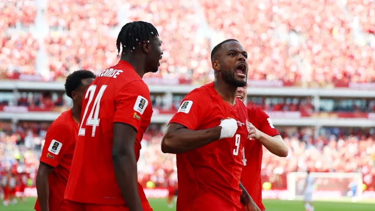 Canadian players celebrating a goal during match Canadian players celebrating a goal during match